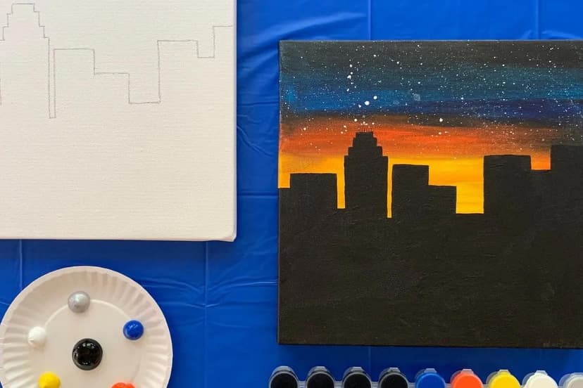 Cityscape sunset canvas painting with sketch outline and paint supplies