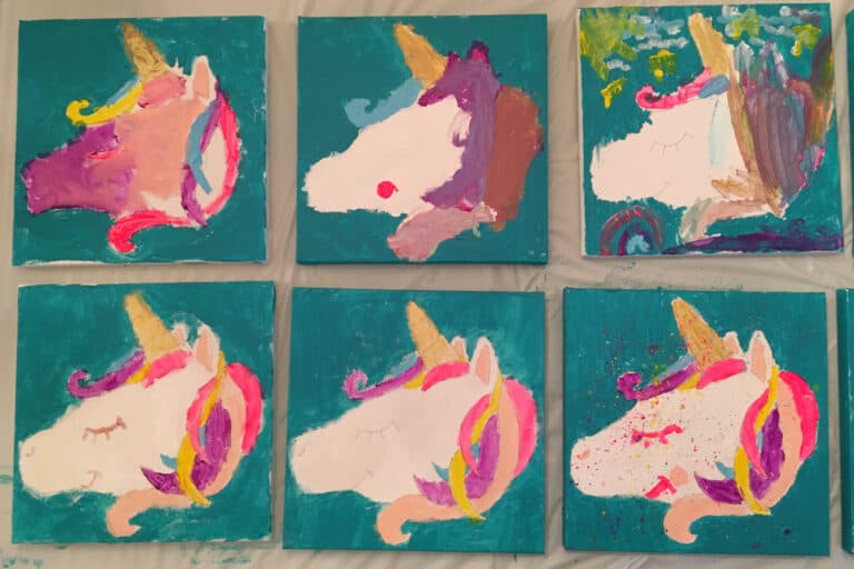 Six unicorn canvas paintings by kids on teal backgrounds